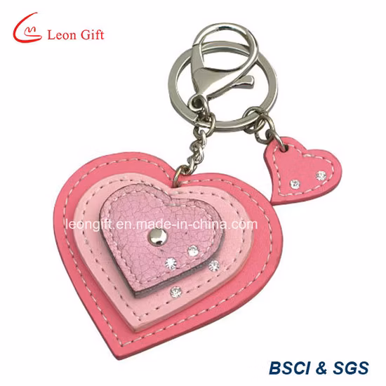 Charme de mode avec logo personnalisé avec porte-clés en métal en cuir en forme de coeur en cristal